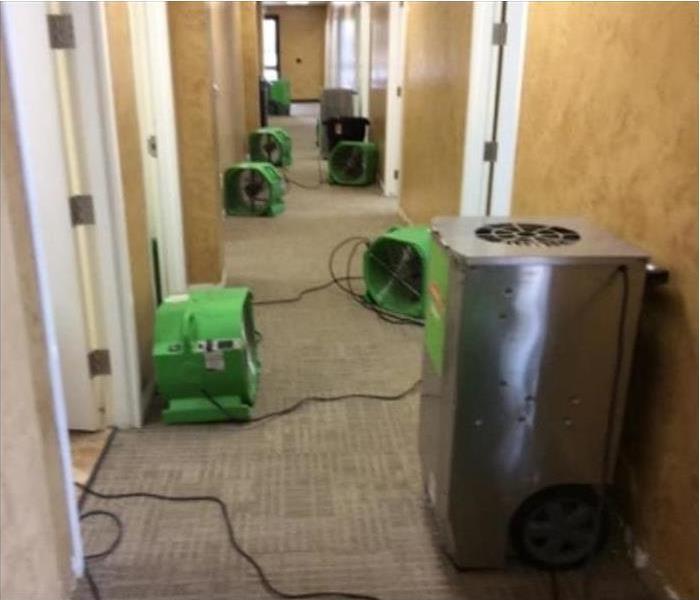 Drying equipment placed along the hallway of a building